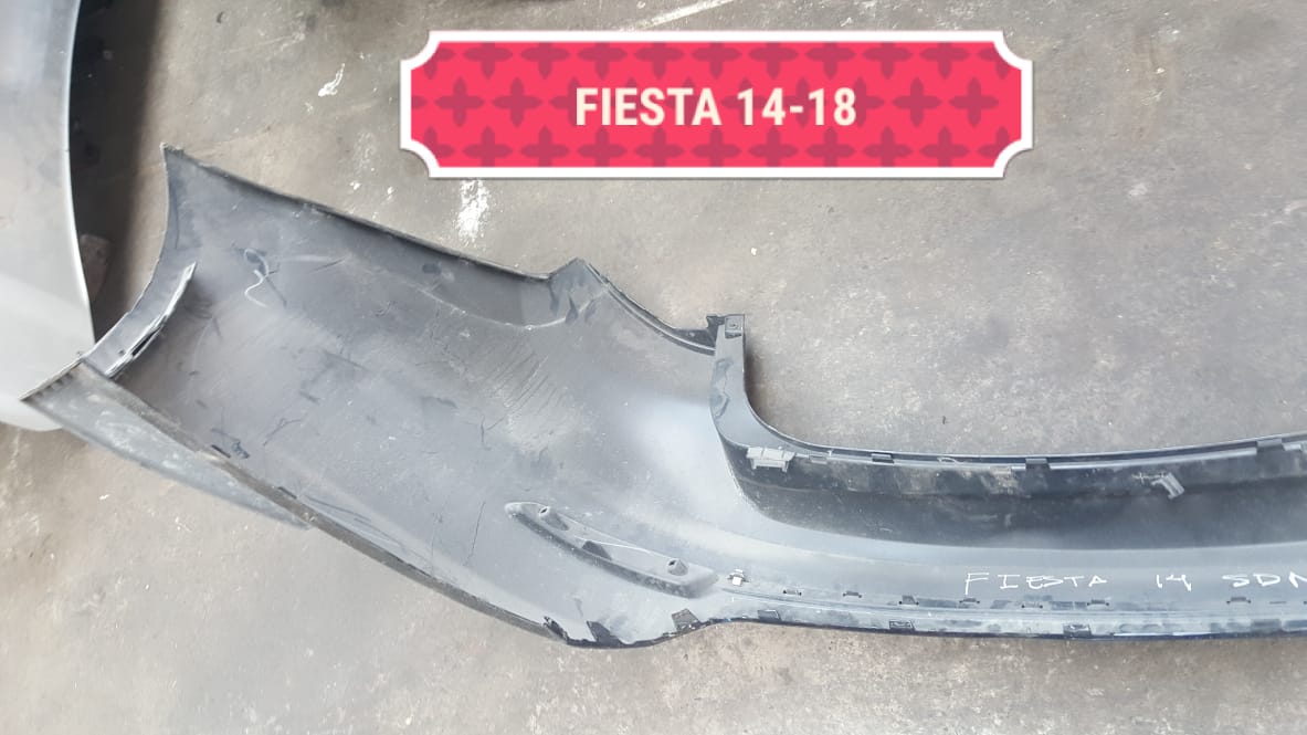 PARACHOQUES POSTERIOR FORD FIESTA SEDAN 2014 AL 2018